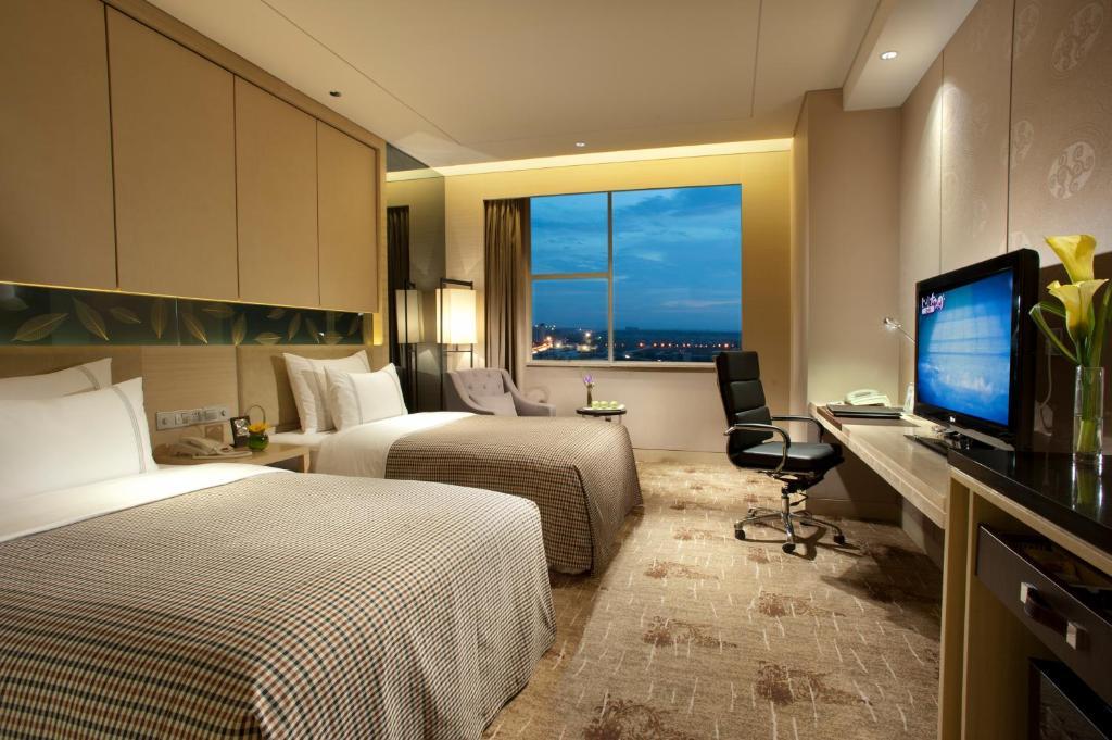 Grand Skylight International Hotel Ganzhou Chang Zhen Avenue Rom bilde